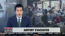 Passengers and workers evacuated from Japan's Kansai International Airport after being stranded for a day