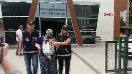 Hırsızlık şüphelisi kadın, adliyeye götürülürken göbek attı