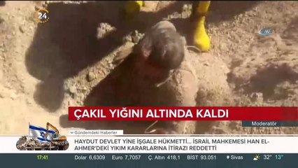 Çakıl yığını altında kaldı
