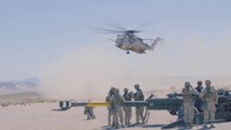 CH-53E Super Stallion helicopter to move an M777 Howitzer