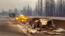 Burnt-Out, Abandoned Trucks Show Speed at Which New California Fire Spread