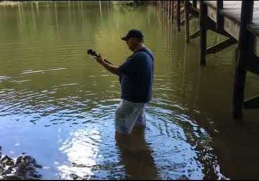 Outdoorsman Combines Fishing and Banjo Practice