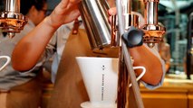 Starbucks opens first Italian location in glossy gold style in Milan