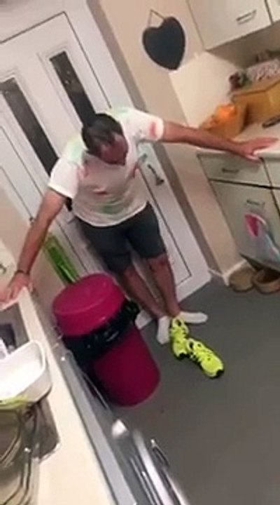 drunk dad starts talking to the bin and hits it
