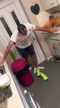 drunk dad starts talking to the bin and hits it