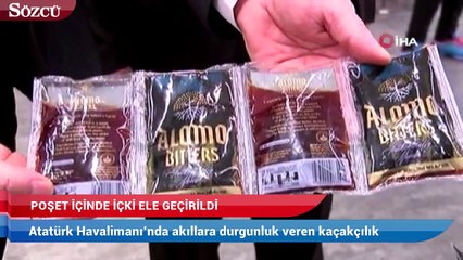 Video herunterladen: Havalimanında poşet içinde içki ele geçirildi