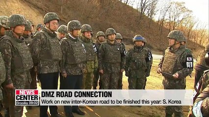 Two Koreas link up new cross-border road in DMZ