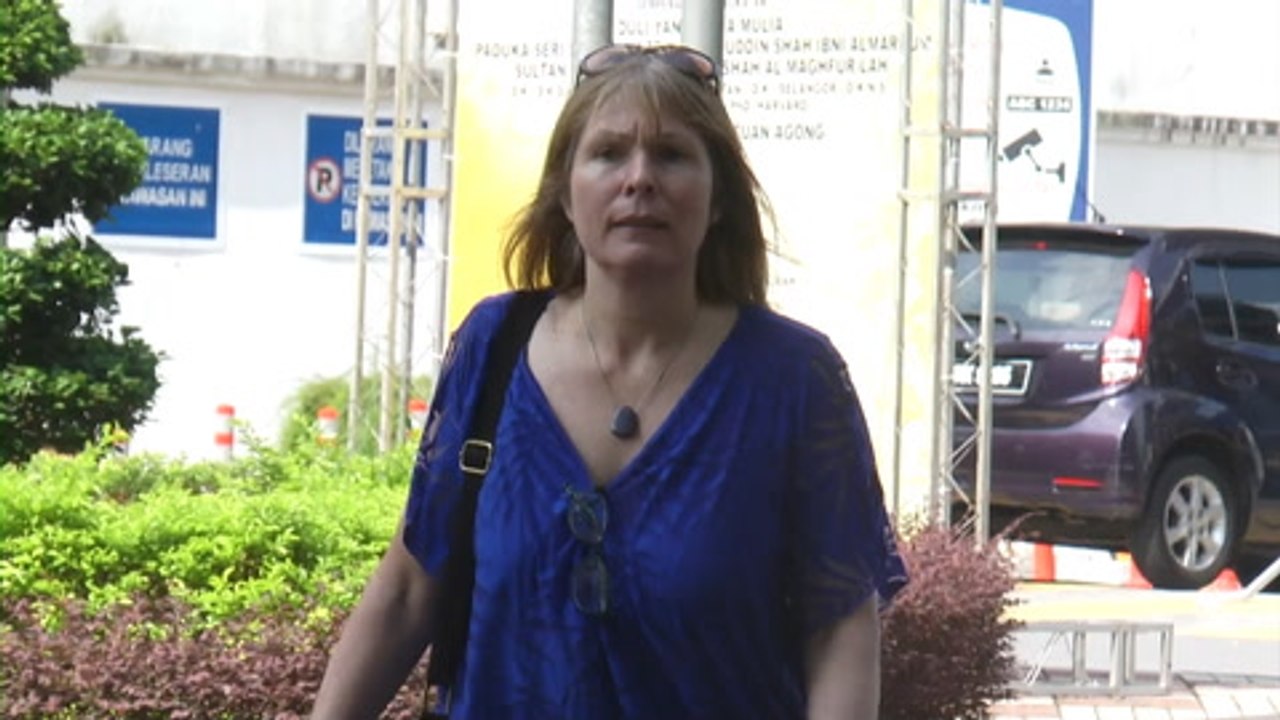 Rewcastle-Brown presents herself at Bukit Aman, questioned for three hours