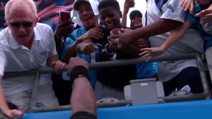 Cam gives ball to kid after scoring on 4-yard TD