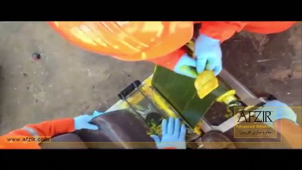 اجرای الیاف FRP با استفاده از دستگاه آغشته ساز به رزین اپوکسی دور ستون پالایشگاه