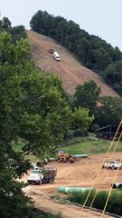 Dozer Makes it Down Extremely Steep Hill