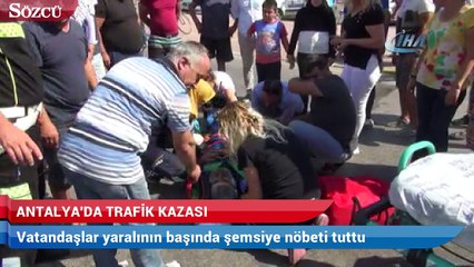 Vatandaşlar yaralının başında şemsiye nöbeti tuttu