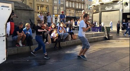 Street Orchestra Joins Busker