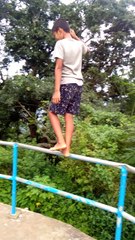 Santi is walking on the pipe - hangin with the family