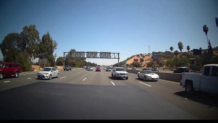 Swerving Car Causes Collision with Truck