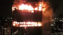 Emergency Services Tackle Building Site Fire in Taiwan
