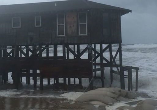 Ocean Roils Around Stilts at Nags Head Home