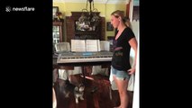 Dog sings alongside owner as she practices opera