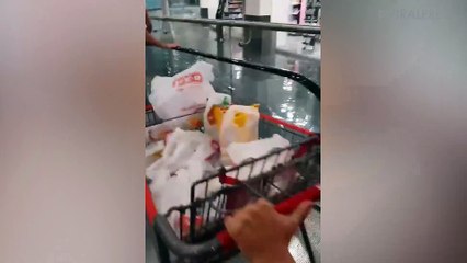 Rain Falls Through Shopping Mall Roof