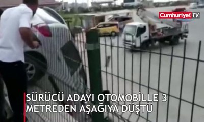 Sürücü adayı otomobille 3 metreden aşağı düştü