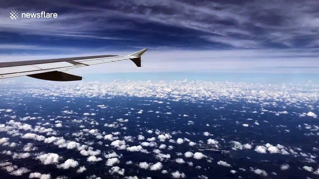 Timelapse clip shows approaching storm from the air