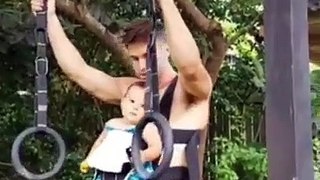 Dad Works Out With His Child