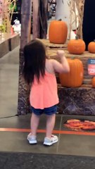 Little Girl Dances to Halloween Theme