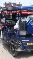 high wire with agirl on an indian high street?????