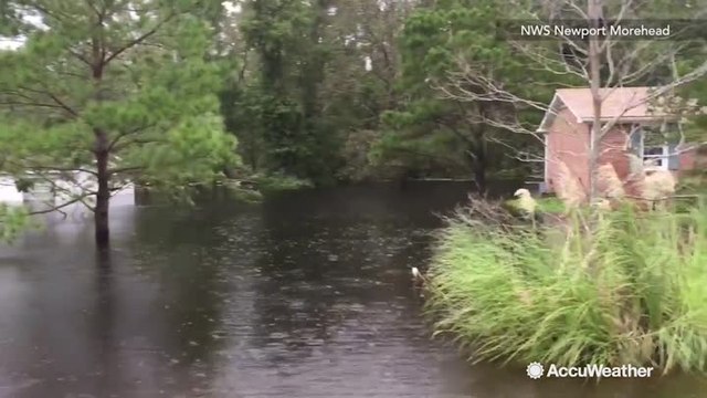Florence leaves roads and yards flooded after Newport River breaks its banks