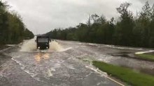 North Carolina National Guard Drives Over Flooded Highways