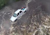 Coast Guard Swimmer Investigates Truck in North Carolina Flooding