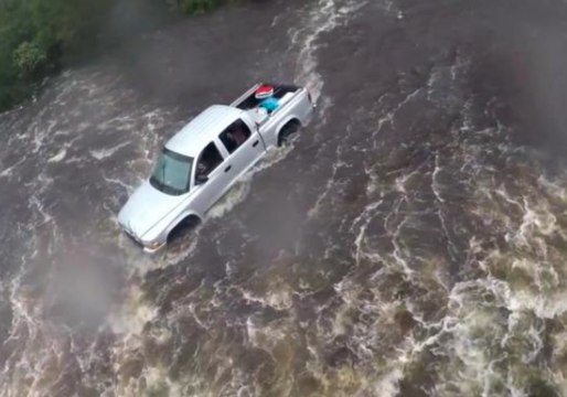 Coast Guard Swimmer Investigates Truck in North Carolina Flooding