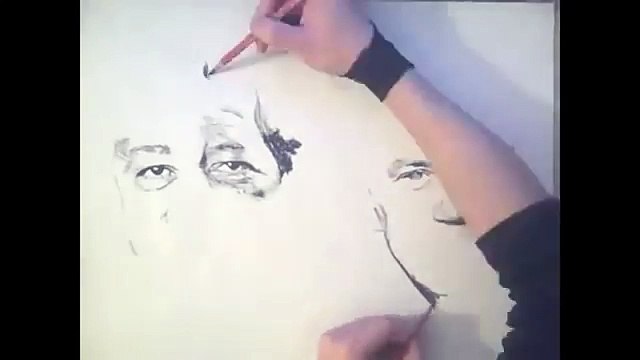 Aynı Anda İki Eliyle Değişik Portreler Yapan Adam