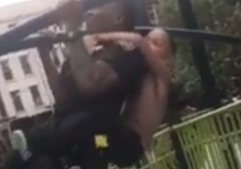New York Police Officer Does 5 Pull-Ups With Ease - Even With a Kid on His Back