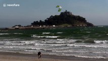 Kite surfers enjoy high winds during Storm Helene