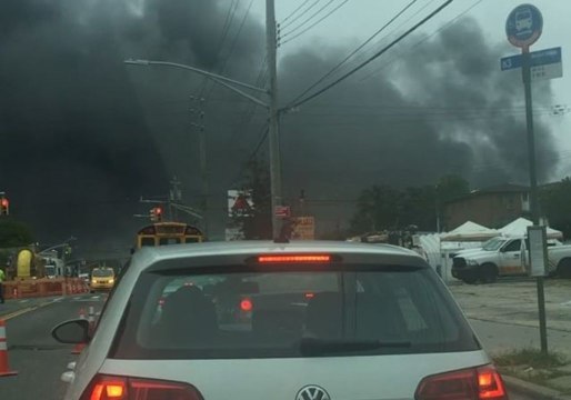 Thick Black Smoke Billows From Parking Garage Fire in Brooklyn