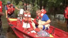 Coast Guard Teams Guide Families Through High Water in North Carolina