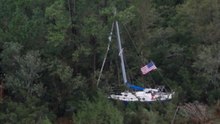 Helicopter Survey Shows Boat Stuck in Trees After Hurricane Florence