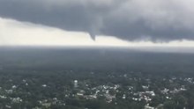 Plane Passenger's Video Shows Funnel Cloud Forming as Multiple Tornadoes Hit Virginia