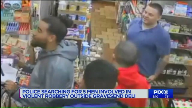 Surveillance Video Shows 5 Men Beating, Robbing Man in NYC