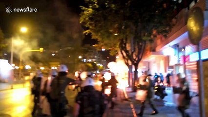 Molotov cocktails fly as five-year memorial anniversary for slain activist-singer turns violent in Athens