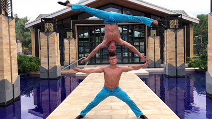 Duo performs crazy headstand 'mirror' stunt