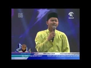 أداء المنشد الماليزي ادريس شمس الدين  في السهرة الاولى لمنشد الشارقة 7