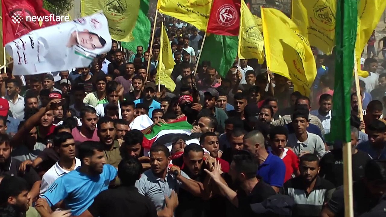 Huge crowds at funeral of Palestinian protester 'killed by Israeli forces'