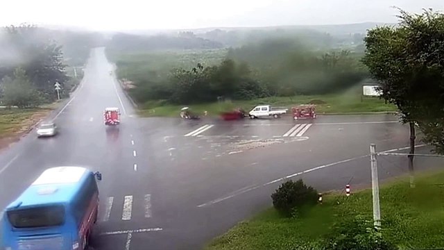 Woman survives being struck by truck and sliding metres across slippery road