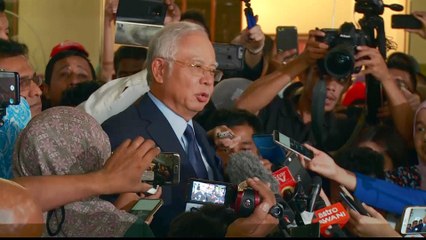 Malaysian ex-PM Najib hit with 25 new charges over 1MDB scandal