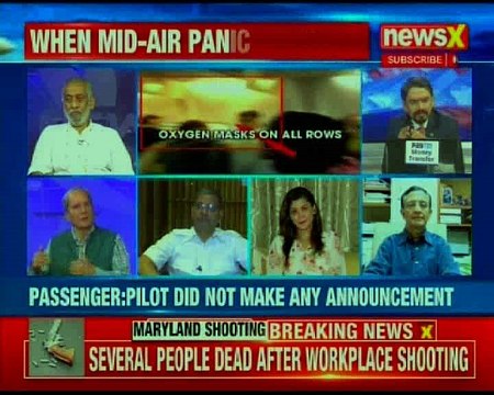 Low cabin pressure, oxygen mask deployed; all passengers deplaned safely, 8 hospitalised