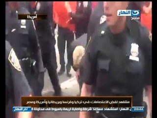 رسالة الي اوباما .. كيفية تعامل الشرطة الامريكية مع المواطنين الامريكين في فض الاعتصامات