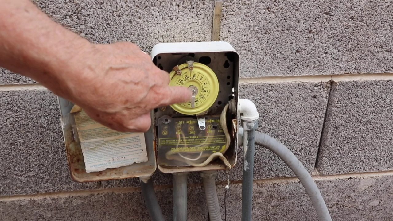 Replacing the timer motor of an Intermatic timer.