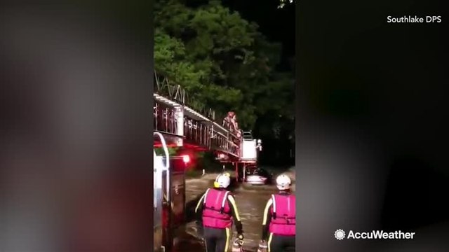 Texas family rescued after car gets trapped by raging floodwaters